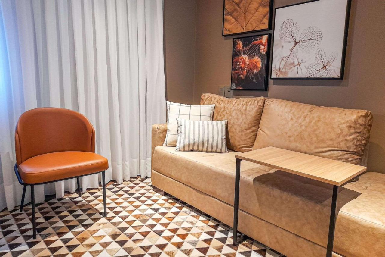 Art Hotel Transamerica Collection Porto Alegre Exterior photo A living room in a suite at the hotel